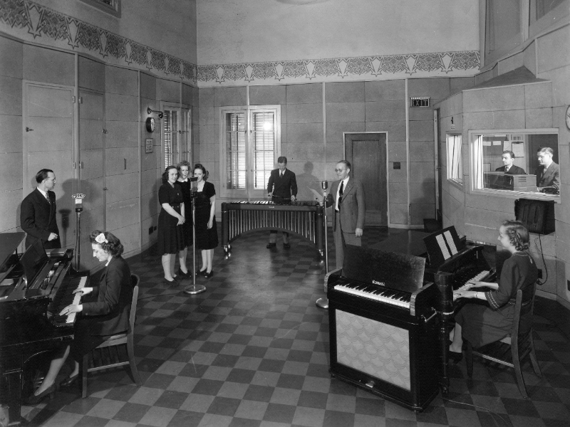 Musicians and radio hosts perform a live broadcast in Moody Radio's Studio A in June 1945.